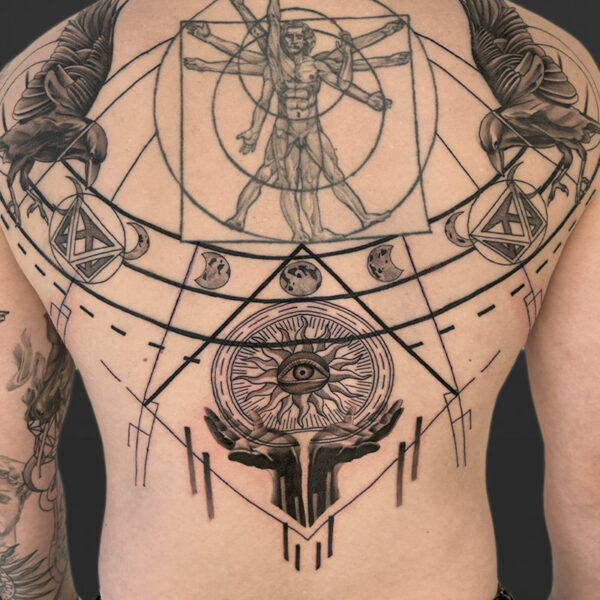 Atticus Tattoo| Black and grey back tattoo of ravens, moon phases, DaVinci spiral, geometric shapes and hands holding the sun