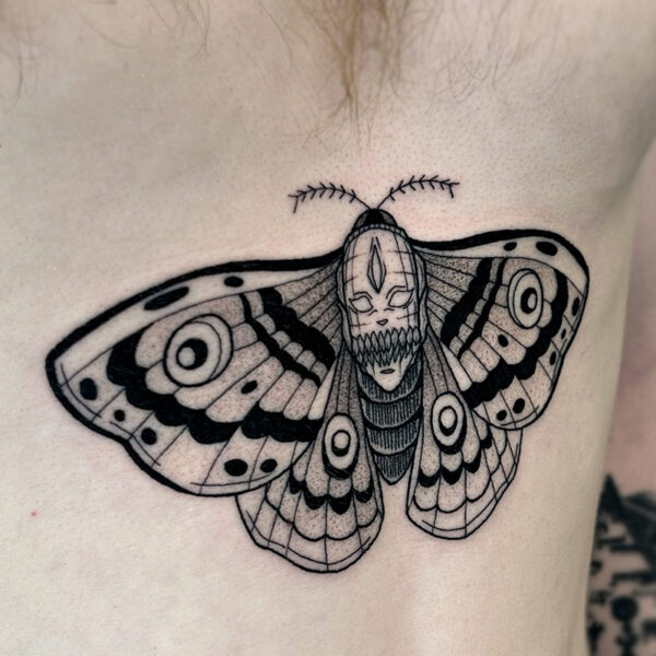 Atticus Tattoo| Black and grey tattoo of a death skull moth