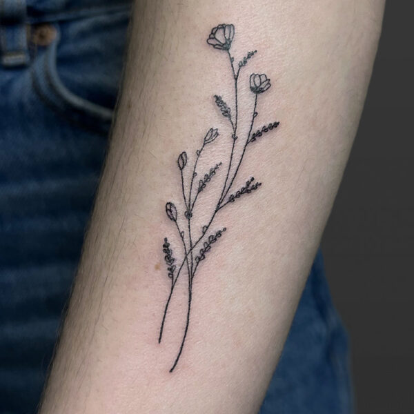 Atticus Tattoo| Fine line tattoo of stems of flowers