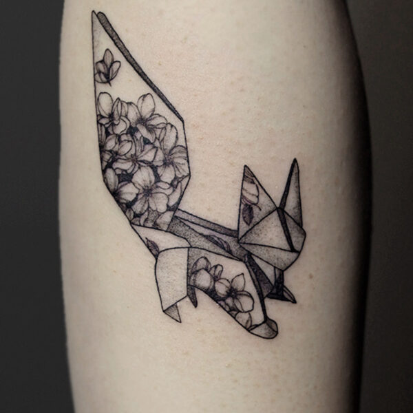 Atticus Tattoo| Fine line tattoo of an origami fox with flowers