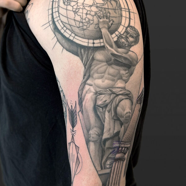 Atticus Tattoo| Royal Tattoo| Black and grey, realism tattoo of Atlas holding the world