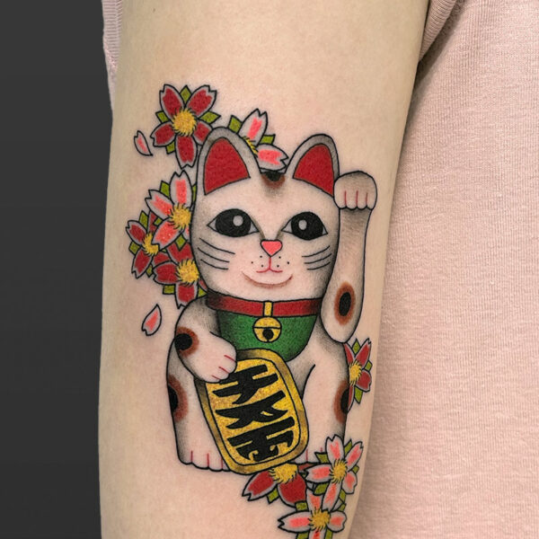 Atticus Tattoo| Neotraditional tattoo of a Chinese waving cat and flowers