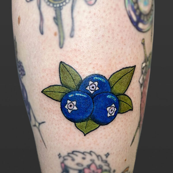 Atticus Tattoo| Tattoo of three blueberries and leaves
