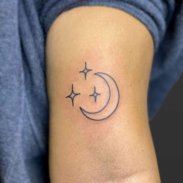 Atticus Tattoo| Fine line tattoo of a crescent moon with three stars