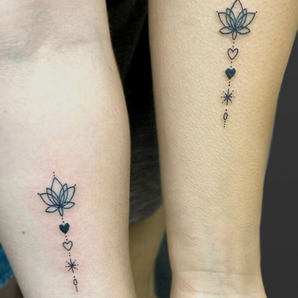 Atticus Tattoo| Fine line, matching tattoos of a lotus, hearts, stars and dots