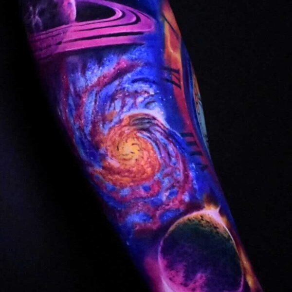 Atticus Tattoo| Colour realism tattoo of planets and space