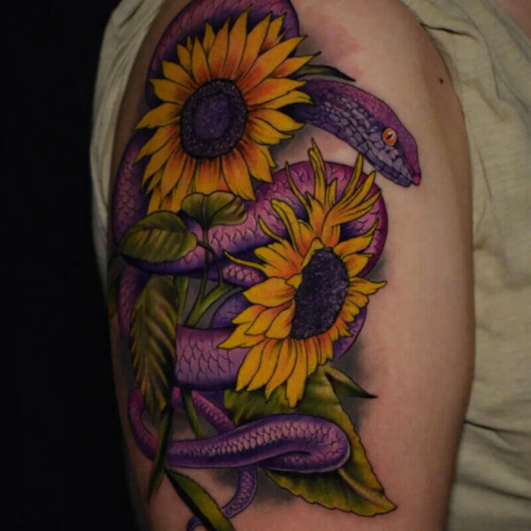 Atticus Tattoo| Colour realism tattoo of a purple snake and yellow sunflowers