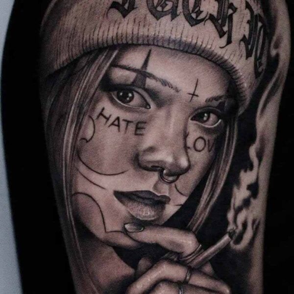 Atticus Tattoo| Black and grey realism tattoo of a woman with face tattoos and smoking