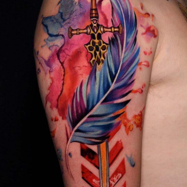 Atticus Tattoo| Watercolour tattoo of a feather and dagger