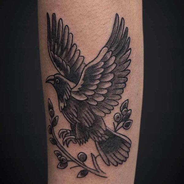 Atticus Tattoo| American traditional tattoo of a raven tree branch