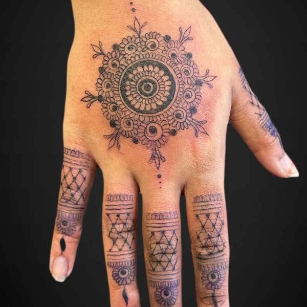 fineline-mandala-ornamental-hand-tattoo