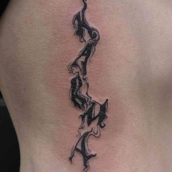 illustrative-abstract-script-tattoo-karma
