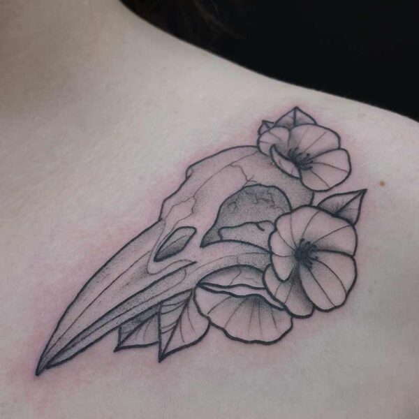neotraditional-tattoo-bird-skull-flowers