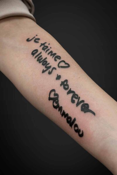 Script tattoo by Jesse at Atticus Tattoo, Calgary