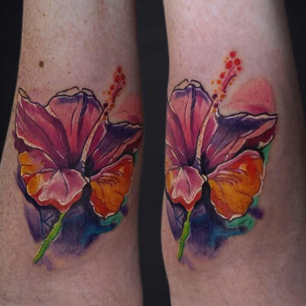 Atticus Tattoo| Watercolour tattoo of a pink and orange hibiscus flower