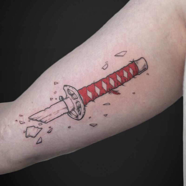 Atticus Tattoo| Anime tattoo of a broken katana hilt