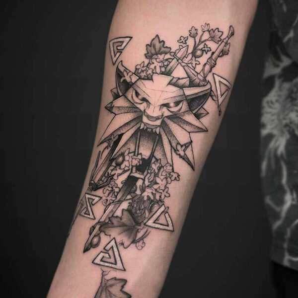 Atticus Tattoo| The Witcher| Video Games| Black and grey tattoo of elements from the video game "The Witcher"