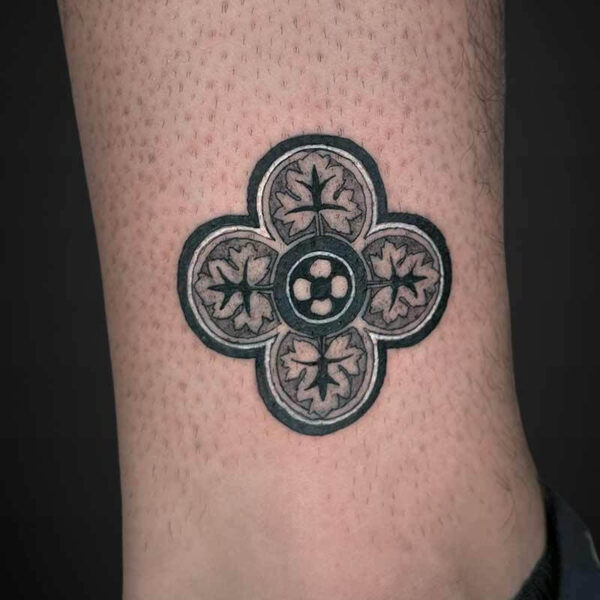 Atticus Tattoo| Geometric tattoo of a clover tile