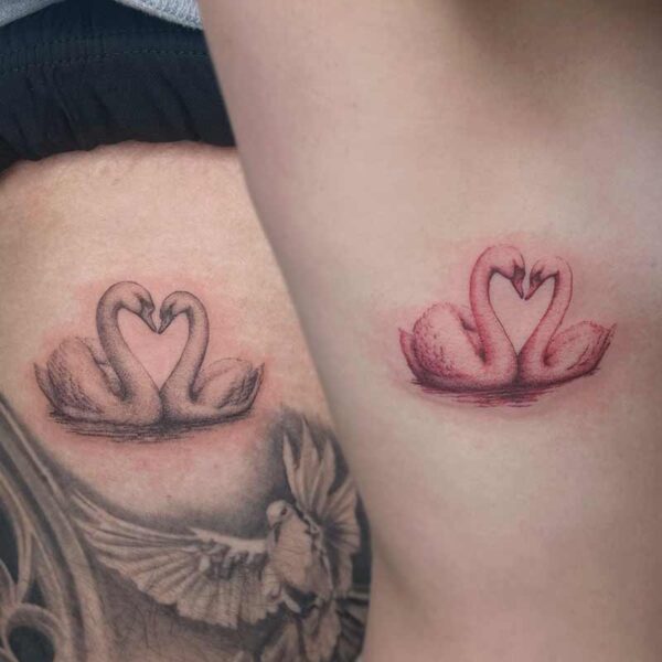 realism-tattoo-matching-swans