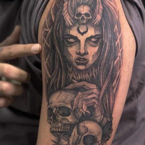 black-grey-tattoo-demon-skulls