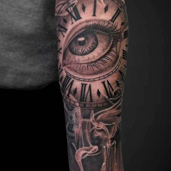 Black and Grey Realism Tattoo- Clock, Eye and Candles Atticus Tattoo| Black and grey realism tattoo of an eye, clock and candle