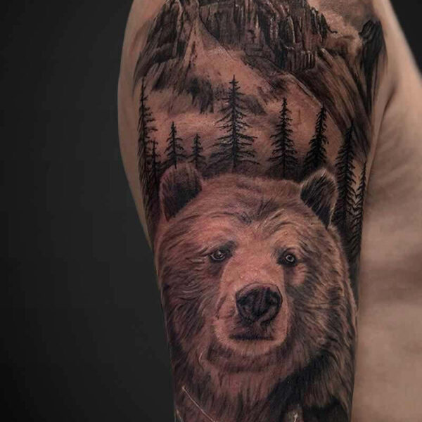 Black and Grey Realism Tattoo- Bear and Mountain Atticus Tattoo| Black and grey realism tattoo of a mountain, grizzly bear and constellation