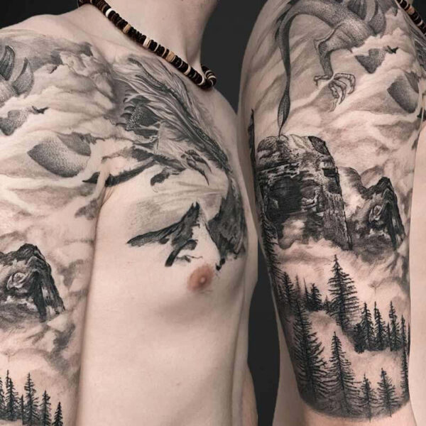 Black and Grey Realism Tattoo- Dragon and Mountains Atticus Tattoo| Black and grey realism tattoo of a mountain scene and Asian dragon