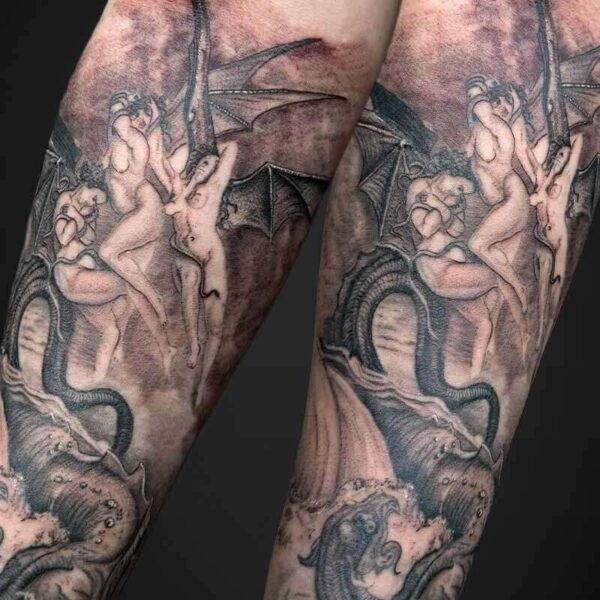 Black and Grey Realism Tattoo- Succubi and Serpent Atticus Tattoo| Black and grey realism tattoo of Succubi and a serpent monster, done a classical art style