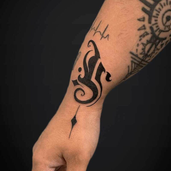 blackwork-script-ornamental-tattoo