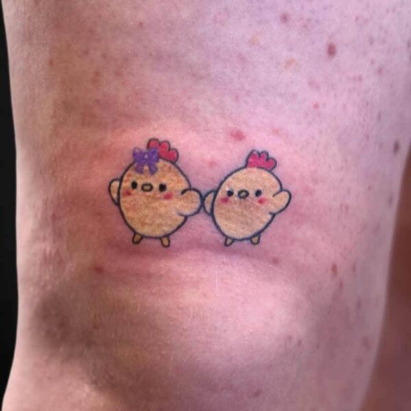Cartoon Tattoo- Baby Chicks Atticus Tattoo| Cartoon tattoo of two little chicks and one has a purple bow