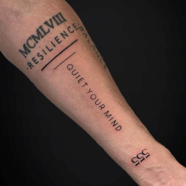 Atticus Tattoo| Fineline tattoo| Script tattoo| Tattoo of two lines with the words "quiet your mind" and "555"