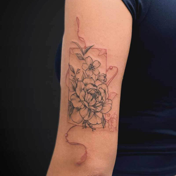 Fineline Tattoo- Floral Norigae Atticus Tattoo| Fineline tattoo of a Norigae with flowers in it