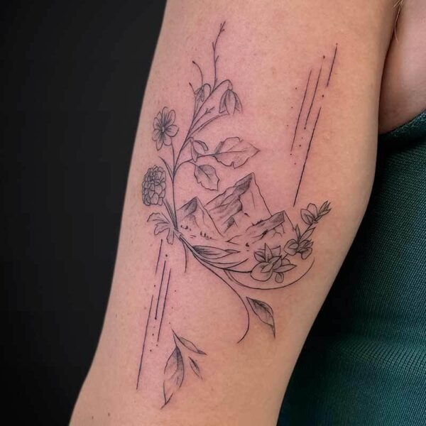 Atticus Tattoo| Fineline tattoo| Mountains| Flowers| Fineline tattoo of mountains with flowers and lines