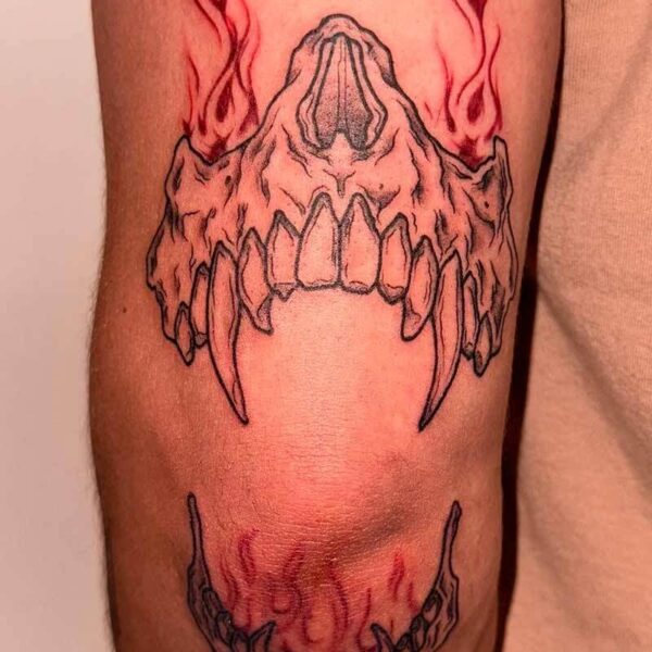 illustrative-tattoo-skull-jaw-flames