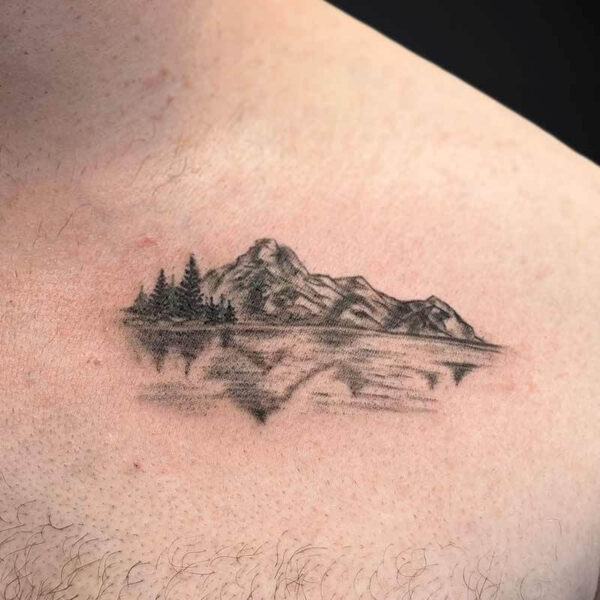 Microrealism Tattoo- Mountains and Lake Atticus Tattoo| Microrealism tattoo of a mountain range with lake and reflection
