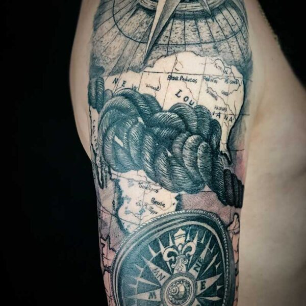 Black and Grey Realism Tattoo- Compass and Sailor's Knot Atticus Tattoo| Black and grey realism tattoo of a map, rope and compass