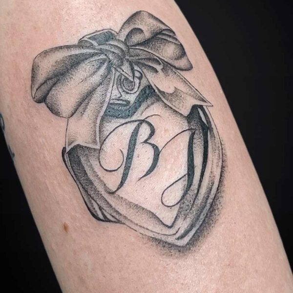 realism-tattoo-hear-locket-ribbon