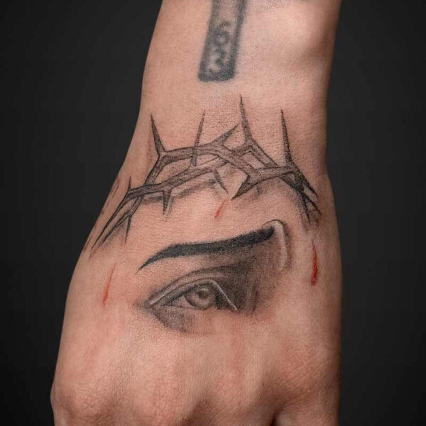 realism-tattoo-jesus-eye-thorns