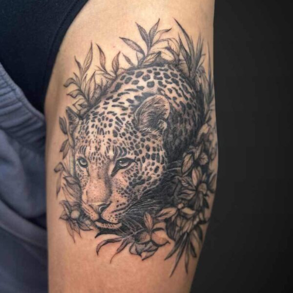 realism-tattoo-leopard-flowers-foliage