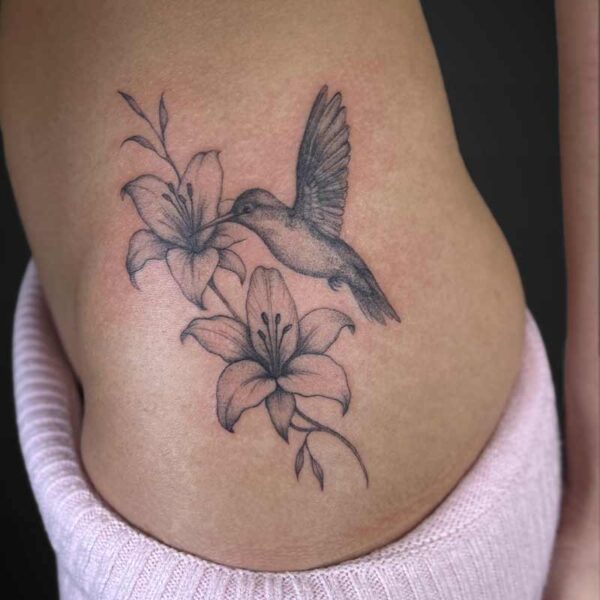 realism-tattoo-lilies-hummingbird