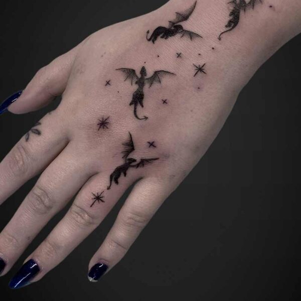 black-grey-tattoo-dragons-stars