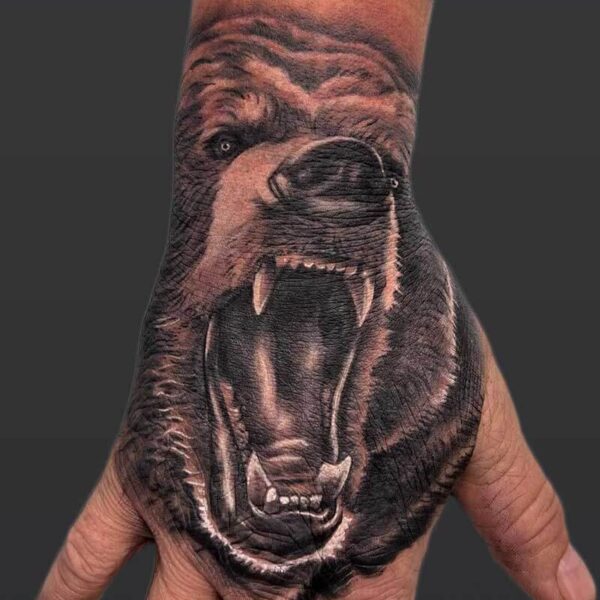 realism_grizzly_hand_tattoo