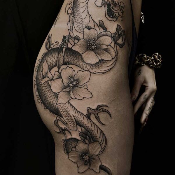 black-grey-tattoo-dragon-flowers