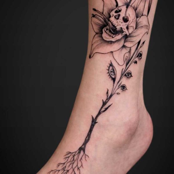 black-grey-tattoo-skull-lily
