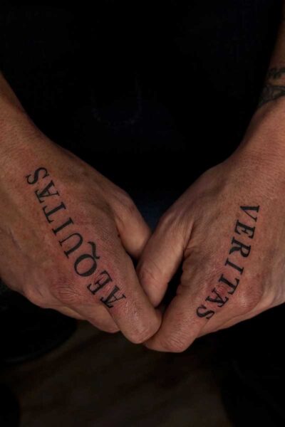 Script tattoo by Mar at Atticus Tattoo, Calgary