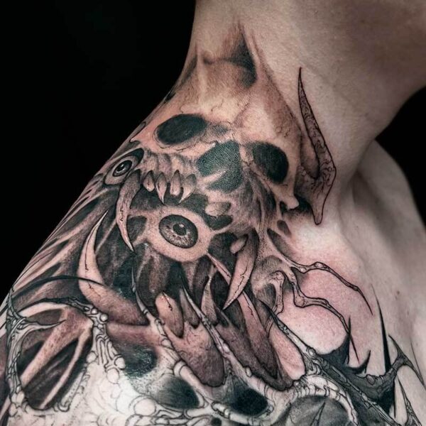 blackwork-tattoo-monster-skull-eyes