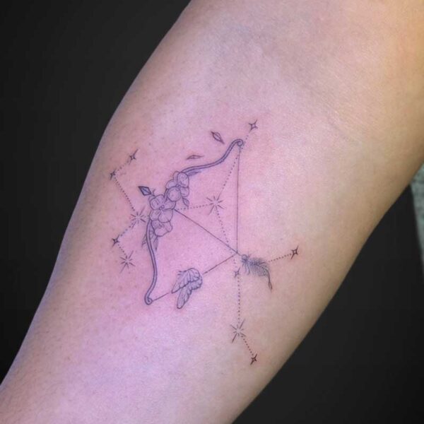 fineline-tattoo-bow-stars-flowers