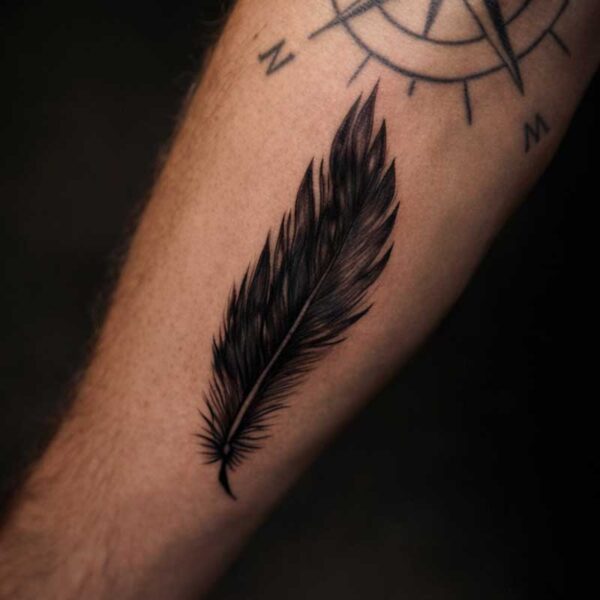 realism-tattoo-black-feather