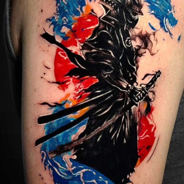 Tattoo of a dark samurai in armor swinging a sword, surrounded by blue and red watercolor splashes.