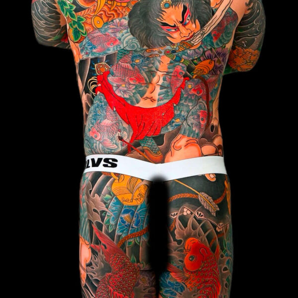 Full-back tattoo scene featuring a fierce samurai with a sword, dragons, koi fish, and vibrant Japanese-style artwork against a black backdrop.